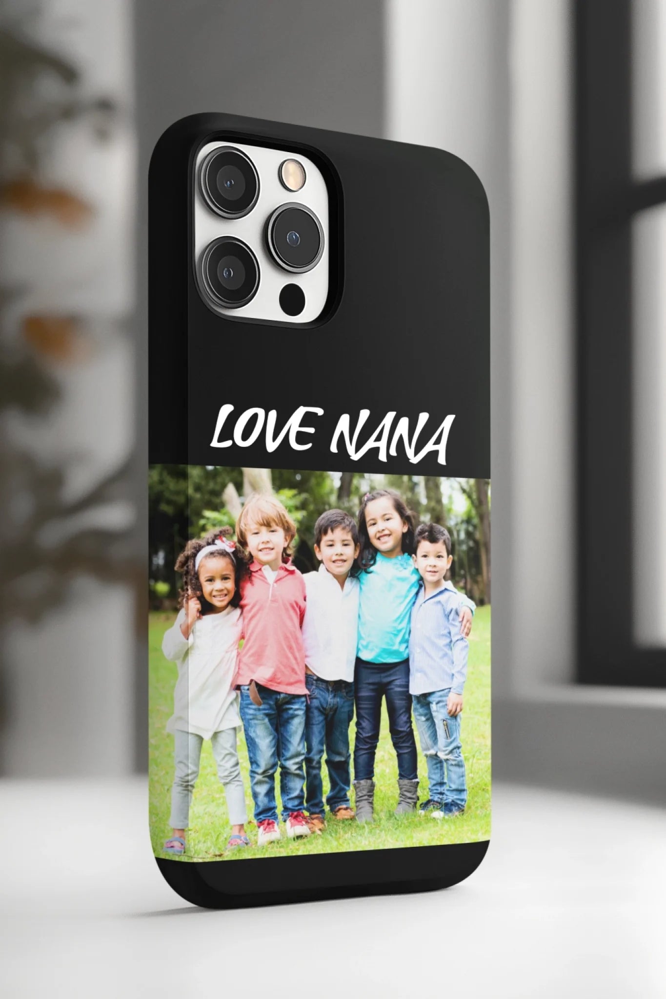 ai-created-phone-case-mockup-featuring-a-blurry-background-of-a-room-m51666 (11)