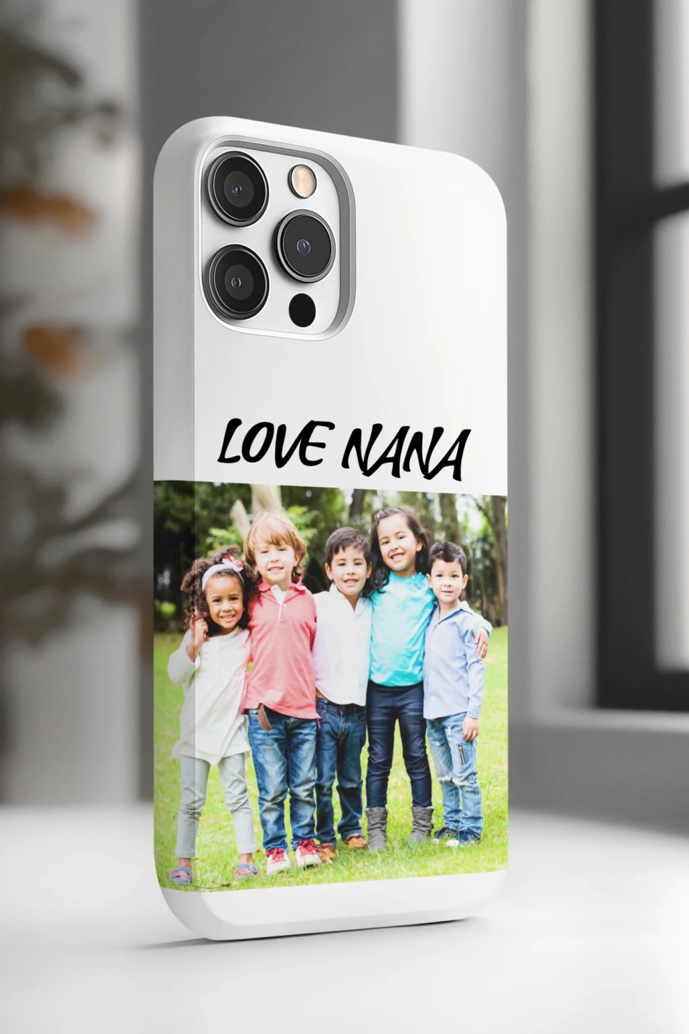 ai-created-phone-case-mockup-featuring-a-blurry-background-of-a-room-m51666 (13)